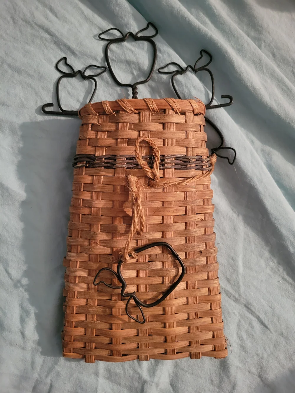 Rustic Black Metal Apple Wall Hook with Woven Basket Accent